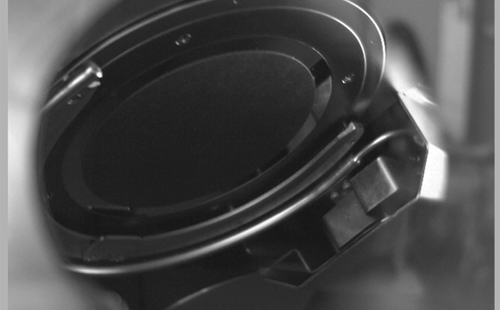 Live video feed of the rotating stage operating inside the Nanoquest II system